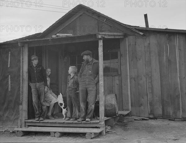 Stump farm family and their present home. Boundary County, Idaho.