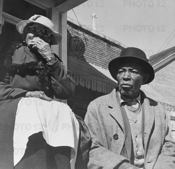 Daytona Beach, Florida. Old friends sitting on the front porch.