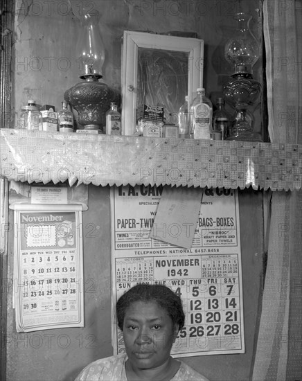 Washington (southwest section), D.C. Negro woman in her home.