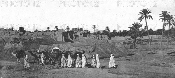 ''A Caravan approaching an old Fort in Biskra', 1890.