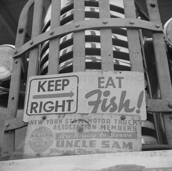 New York, New York. Sign on front of a motor truck.