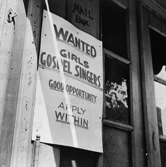 New York, New York. A sign in the Harlem section.