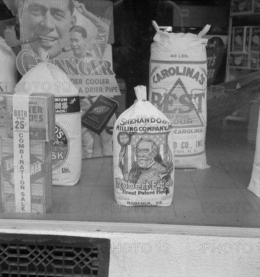 Grocery store window. Mebane, North Carolina.