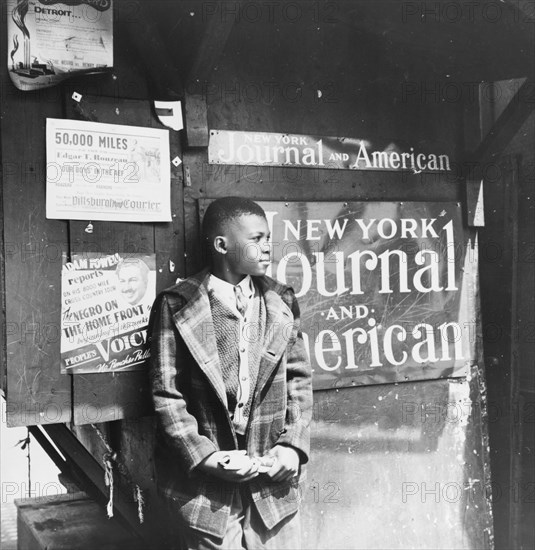 New York, New York. Harlem newsboy.