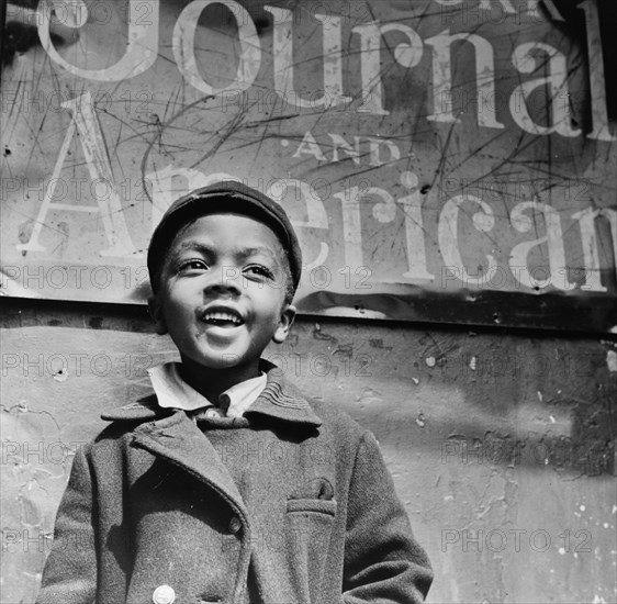 New York, New York. Harlem newsboy.