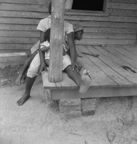 [Untitled - children on porch].