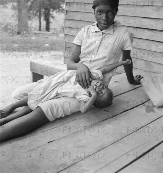 [Untitled - children on porch].