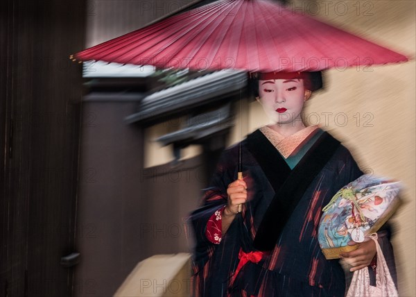 Geisha in the Rain (A).