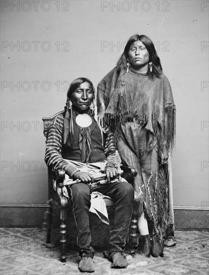 Lone Wolf and his wife Etla, Kiowa Indians, between 1855 and 1865. Creator: Unknown.