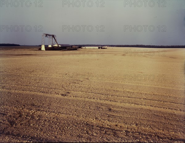 Bean canning factory in the field, Seabrook farm, Bridgeton, N.J., 1942. Creator: John Collier.