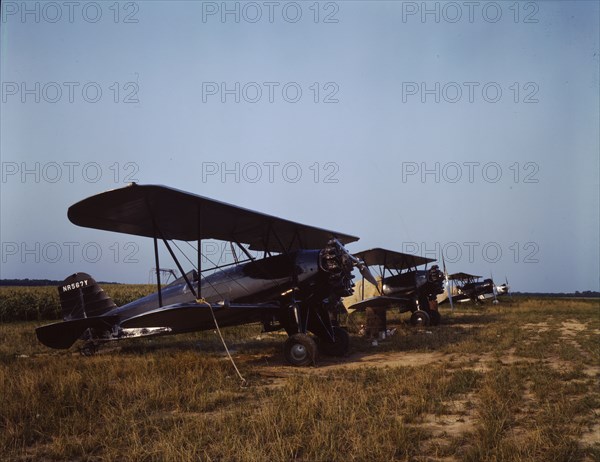 Low flying planes from which dust or insecticide is spread..., Seabrook Farm, Bridgeton, N.J., 1942. Creator: John Collier.