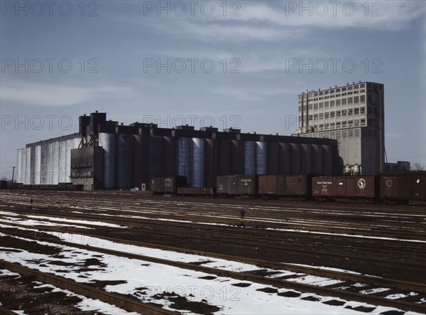 The giant 10 million bushel grain elevator of the Santa Fe R.R., Kansas, 1943. Creator: Jack Delano.