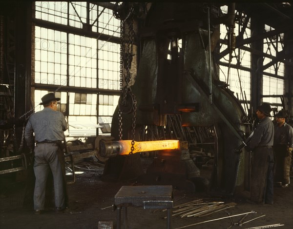 Hammering out a draw bar on the steam drop..., Santa Fe R.R. shops, Albuquerque, New Mexico, 1943. Creator: Jack Delano.