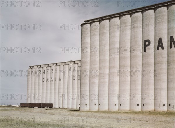 Grain elevators near Amarillo, Texas; Santa Fe trip, 1943. Creator: Jack Delano.