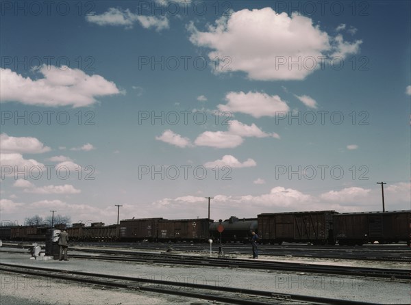 In the Santa Fe R.R. yards, Belen, New Mexico, 1943. Creator: Jack Delano.