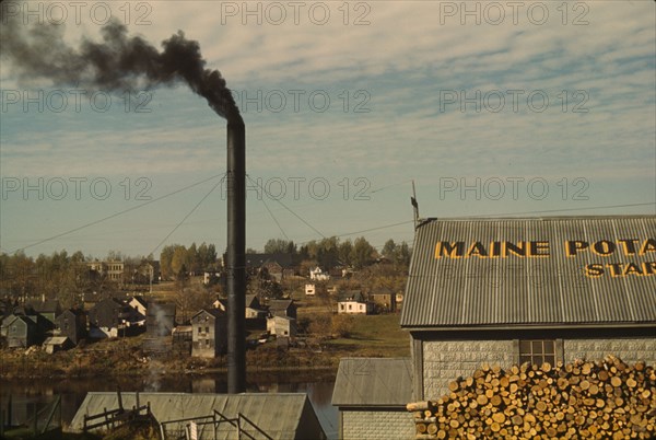 A starch factory along the Aroostook River, Caribou, Aroostook County, Maine., 1940. Creator: Jack Delano.