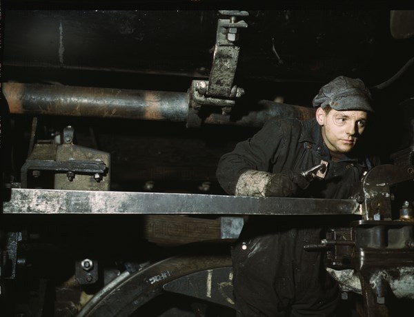 A young worker at the C & NW RR 40th Street shops, Chicago, Ill., 1942. Creator: Jack Delano.