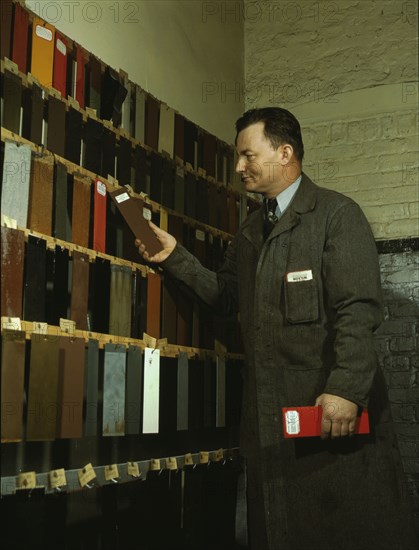 Laboratory worker at the research laboratory at the C & NW RR's 40th Street yard, Chicago, 1942. Creator: Jack Delano.