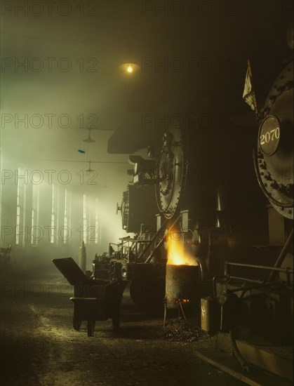 C & NW RR locomotives in the roundhouse at Proviso yard, Chicago, Ill., 1942. Creator: Jack Delano.