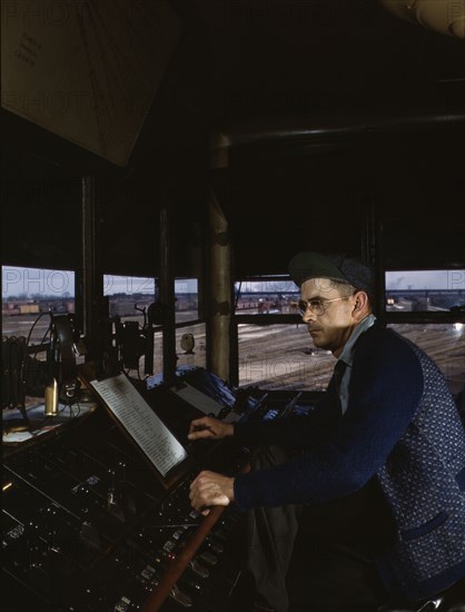 C&NWRR towerman R.W. Mayberry of Elmhurst, Ill., at the Proviso yard, Melrose Park, Ill., 1943. Creator: Jack Delano.