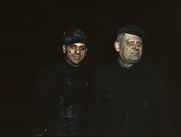 Two employees at the roundhouse at Proviso yard, C & NW RR, Chicago, Ill., 1942. Creator: Jack Delano.