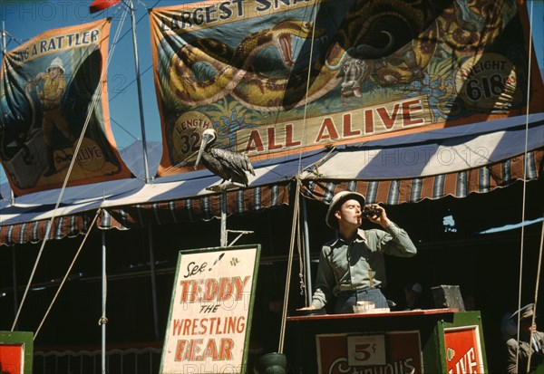 Barker at the grounds at the Vermont state fair, Rutland, 1941. Creator: Jack Delano.