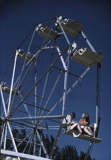 On the ferris wheel at the Vermont state fair, Rutland, 1941. Creator: Jack Delano.