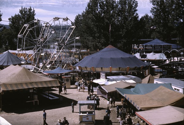 Side shows at the Vermont state fair, Rutland, 1941. Creator: Jack Delano.