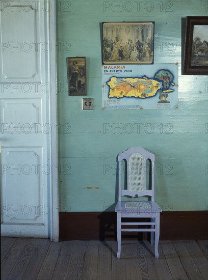 Malaria poster in small hotel, Puerto Rico ... San Juan, 1941. Creator: Jack Delano.