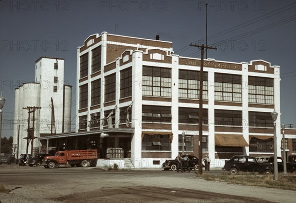 Milk and butter fat receiving depot and creamery, Caldwell, Idaho, 1941. Creator: Russell Lee.