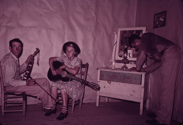 Orchestra during intermission at square dance, McIntosh County, Oklahoma, 1939 or 1940. Creator: Russell Lee.