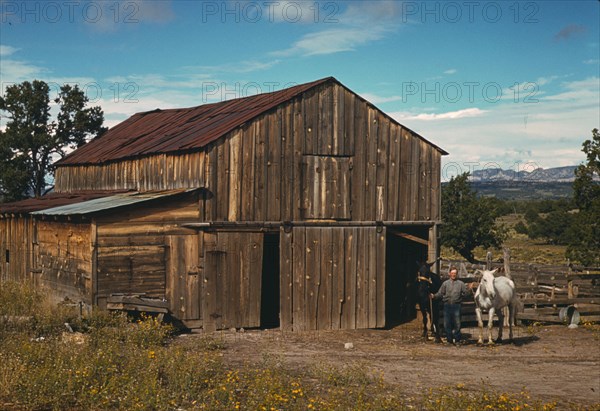 Bill Stagg, homesteader, in front of his barn, Pie Town, New Mexico, 1940. Creator: Russell Lee.