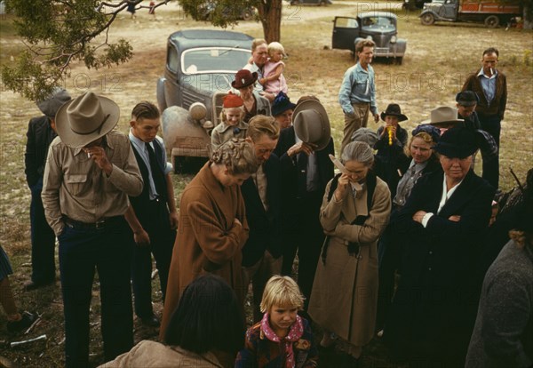 Grace was said before the barbeque was served at the Pie Town, New Mexico Fair, 1940. Creator: Russell Lee.