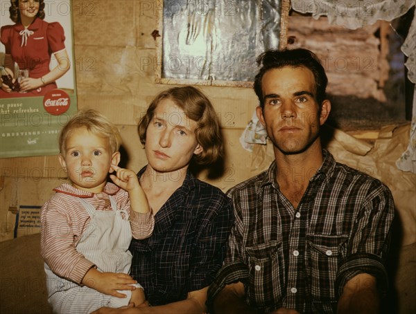 Jack Whinery, homesteader, with his wife and the youngest of his five..., Pie Town, New Mexico, 1940 Creator: Russell Lee.