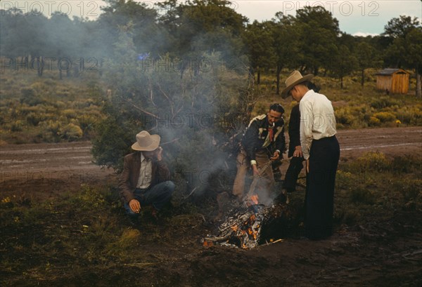 Men in front of outdoor fire, Pie Town Fair, New Mexico, 1940. Creator: Russell Lee.