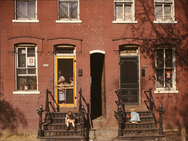 Children on row house steps, Washington, D.C., between 1941 and 1942. Creator: Louise Rosskam.
