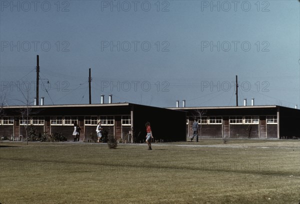 Row shelters, FSA ... labor camp, Robstown, Tex., 1942. Creator: Arthur Rothstein.
