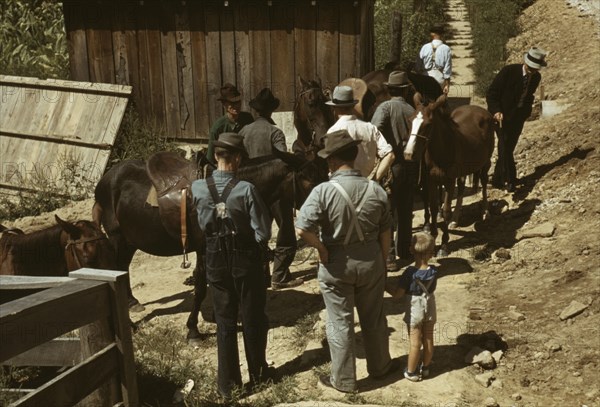 Mountaineers and farmers trading mules and horses on "Jockey St.,", Campton, Wolfe County, Ky., 1940 Creator: Marion Post Wolcott.