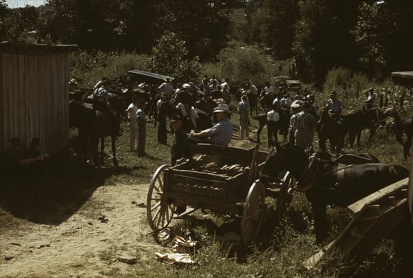 Mountaineers and farmers trading mules and horses on "Jockey St.,", Campton, Wolfe County, Ky., 1940 Creator: Marion Post Wolcott.