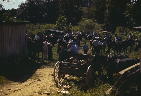 Mountaineers and farmers trading mules and horses on "Jockey St.,", Campton, Wolfe County, Ky., 1940 Creator: Marion Post Wolcott.