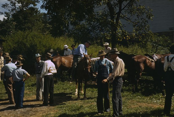 Mountaineers and farmers trading mules and horses on "Jockey St.,", Campton, Wolfe County, Ky., 1940 Creator: Marion Post Wolcott.