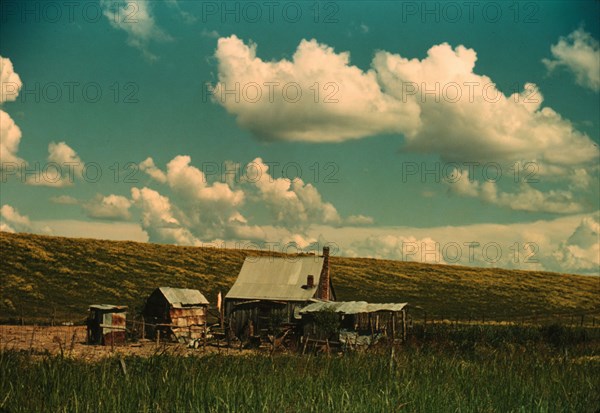 Negro tenant's home beside the Mississippi River levee, near Lake Providence, La., 1940. Creator: Marion Post Wolcott.