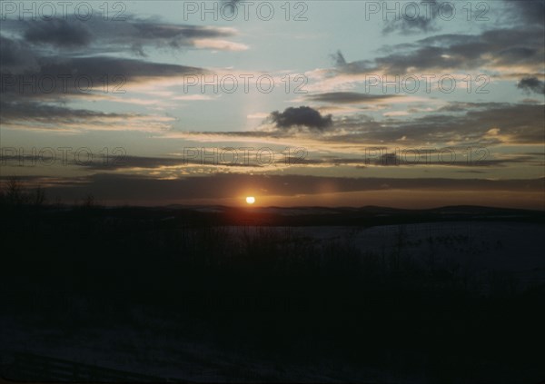 Sunrise or sunset, between 1941 and 1942. Creator: Unknown.