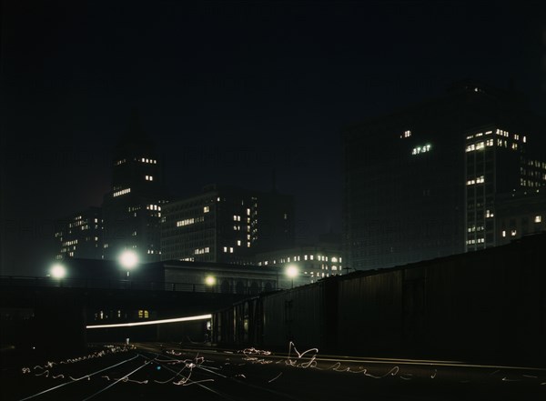 Night view of part of the South Water street freight terminal...Illinois Central R.R., Chicago, 1943 Creator: Jack Delano.