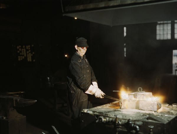 John Kelseh [i.e., Kelsch], blacksmith, at his forge..., Rock Island R.R., Blue Island, Ill., 1943. Creator: Jack Delano.