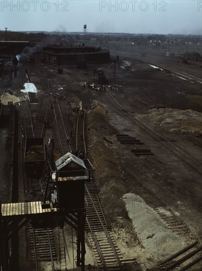 Track repair work at the Bensenville yard of the Chicago, Milwaukee..., Illinois, 1943. Creator: Jack Delano.