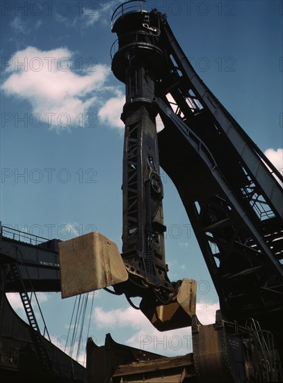 Pennsylvania R.R. ore docks, a "Hulett" unloader in operation, Cleveland, Ohio, 1943. Creator: Jack Delano.