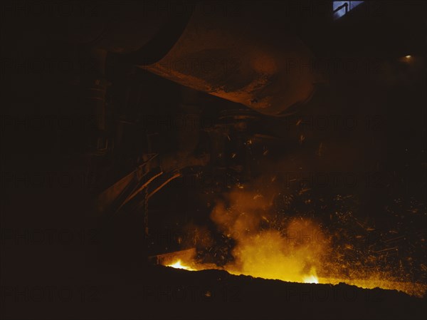 Slag run-off from open hearth furnace, Republic Steel Corp., Youngstown, Ohio, 1941. Creator: Alfred T Palmer.