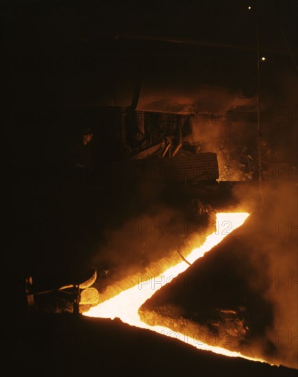 Slag run-off from one of the open hearth furnaces..., Republic Steel Corp., Youngstown, Ohio, 1941. Creator: Alfred T Palmer.