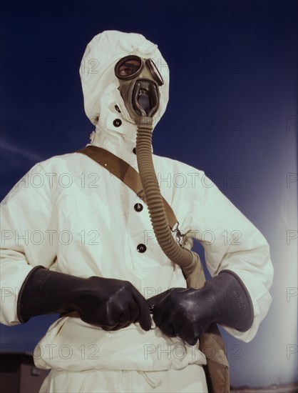 Sailor at the Naval Air Base wears the new type protective clothing...Corpus Christi, Texas, 1942. Creator: Howard Hollem.